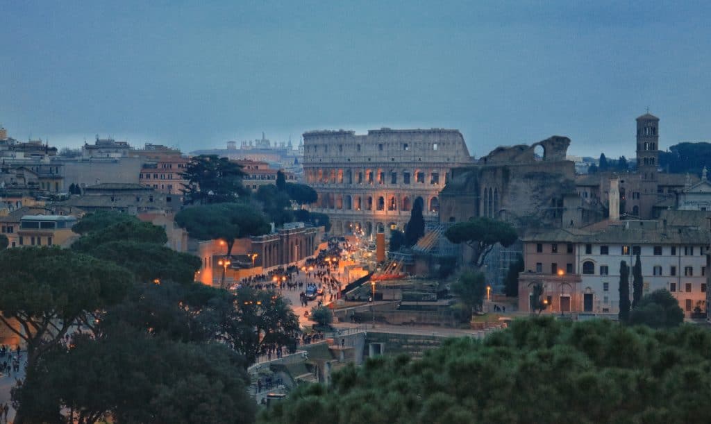 Road leading to the colosseum at night 