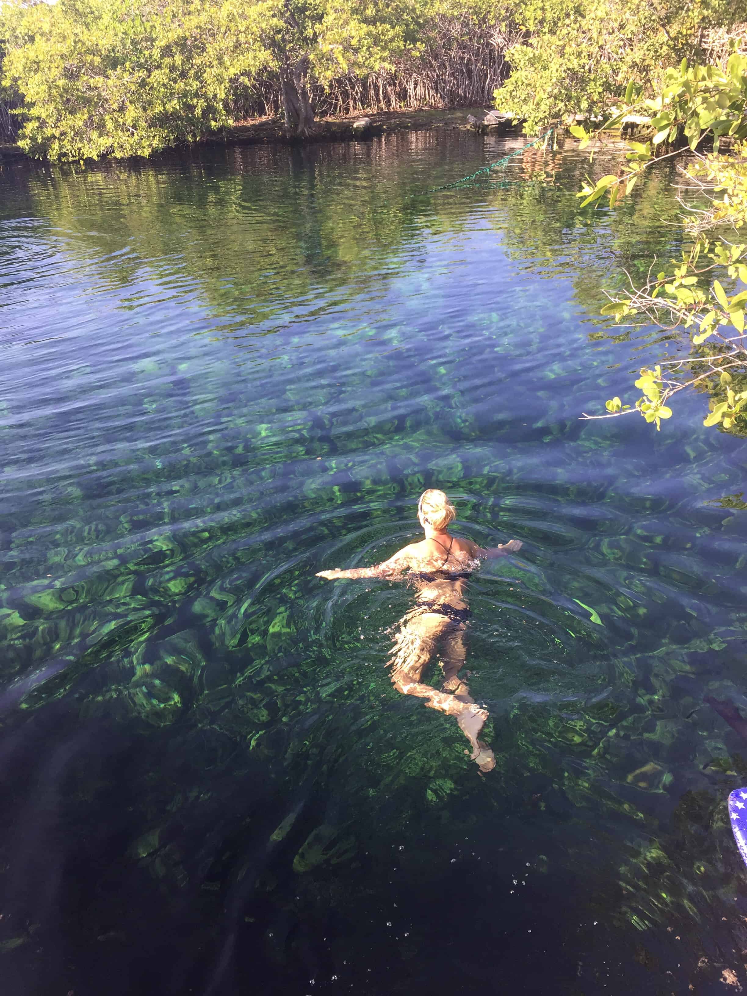 Girl in Cenote Cape-Ha in Tulum