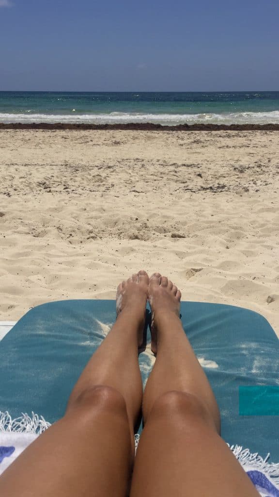 Legs on a beach Nativus Tulum