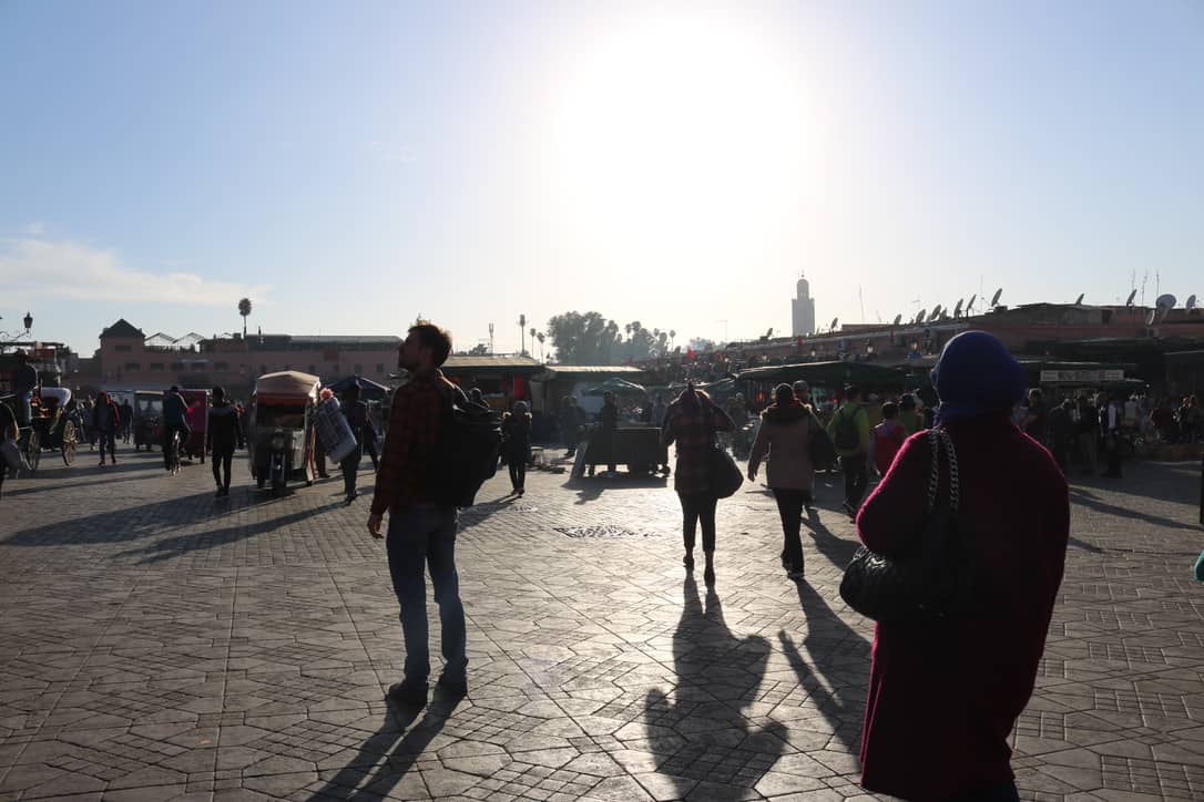 Boy standing on djemaa el fna in marrakech