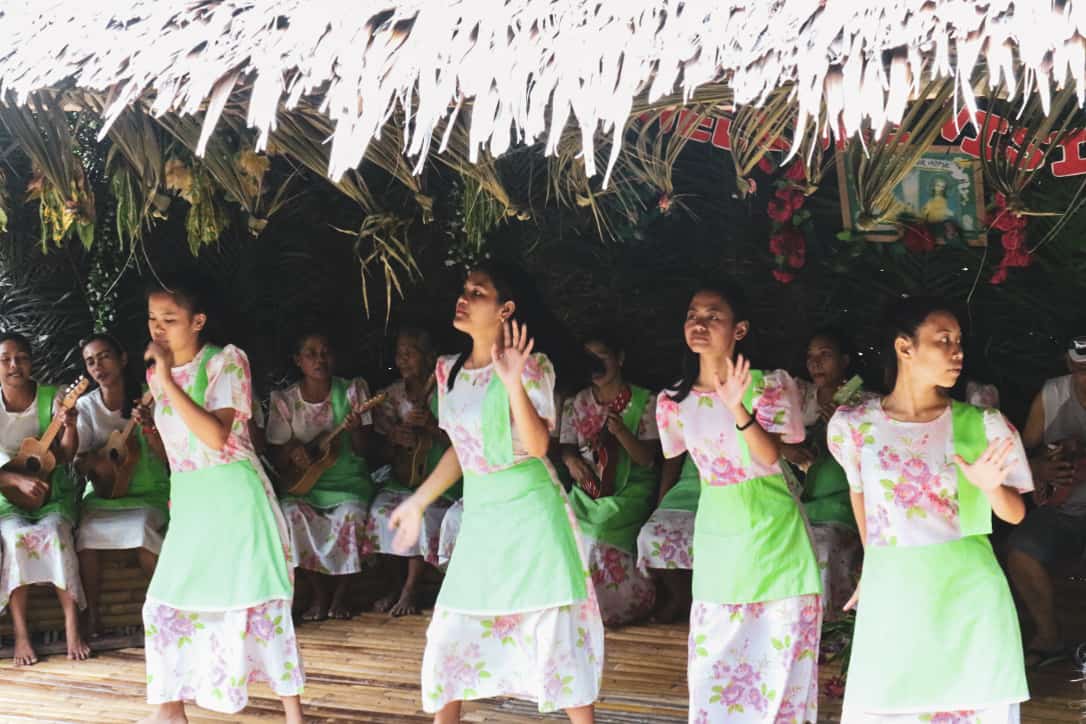 Philippine girls dancing in traditional clothes